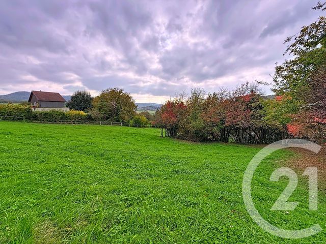 Afficher la photo en grand terrain à vendre - 1411.0 m2 - SOLEMONT - 25 - FRANCHE-COMTE - Century 21 Rollat Immobilier